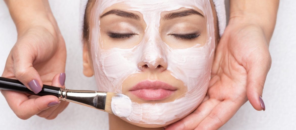 woman-receiving-facial-mask-at-beauty-salon-2023-11-27-05-17-03-utc